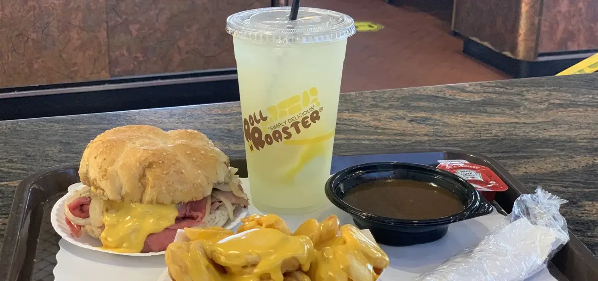 a sandwich and fries on a table